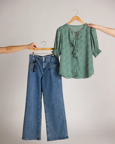 Workwear outfit styled together on a hanger