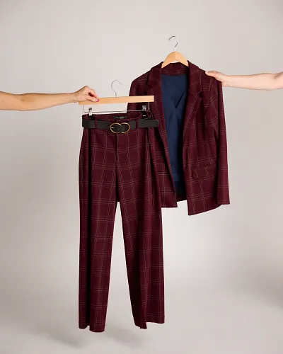 Polished workwear separates styled on a hanger